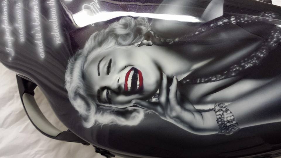 Airbrushed Painting of a Violin Case with a Marilyn Monroe image